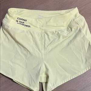 Athleta Pale Yellow Athletic Shorts